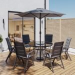 6 seater Grey Metal Garden Dining Set with Lazy Susan Parasol & Padded Foldable Chairs - Fortrose